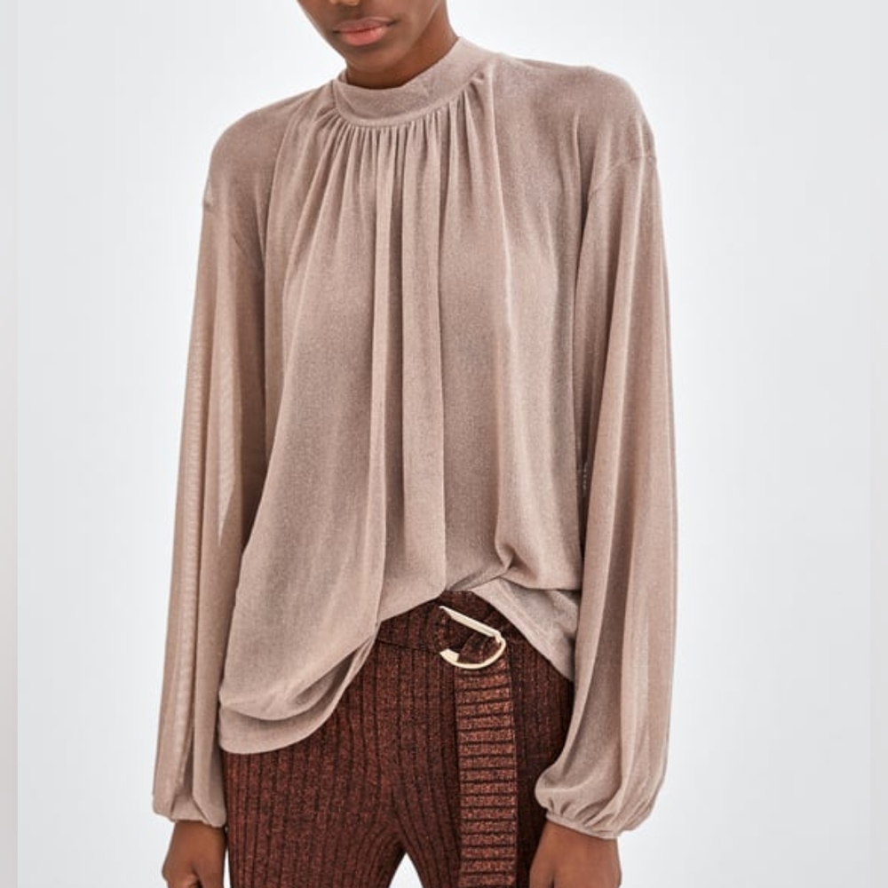 Light transparent shirt with glitter details